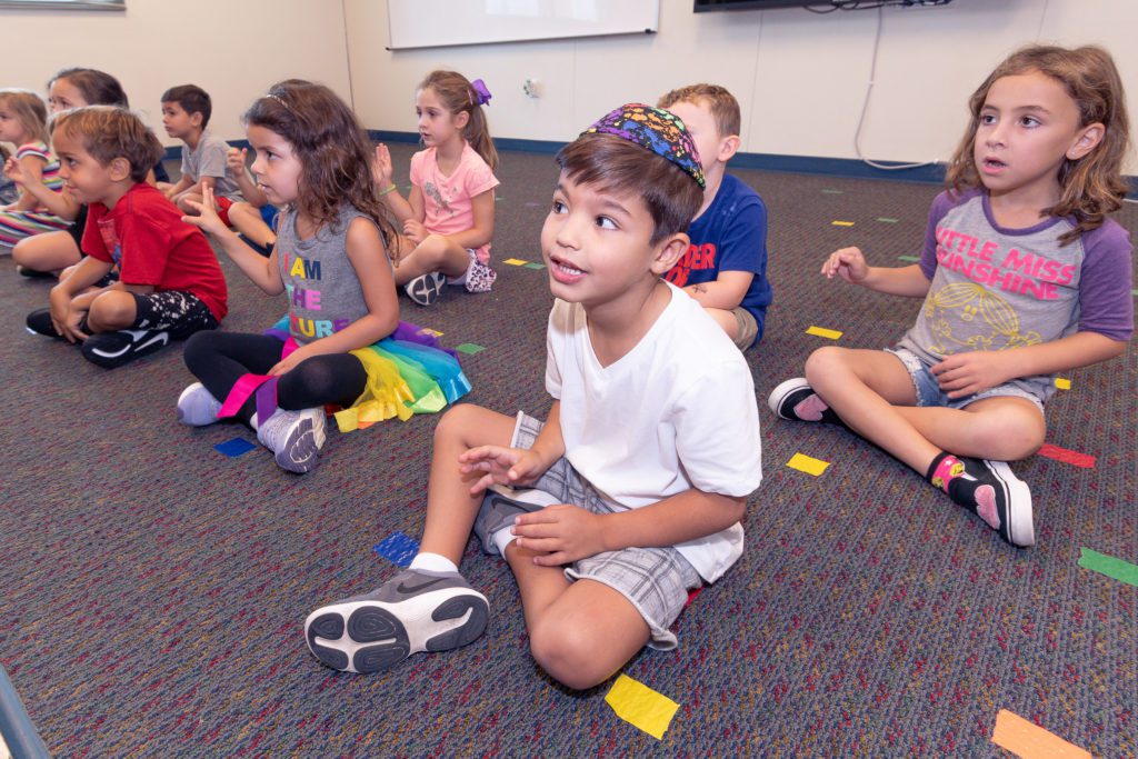 Class participating in a seated activity